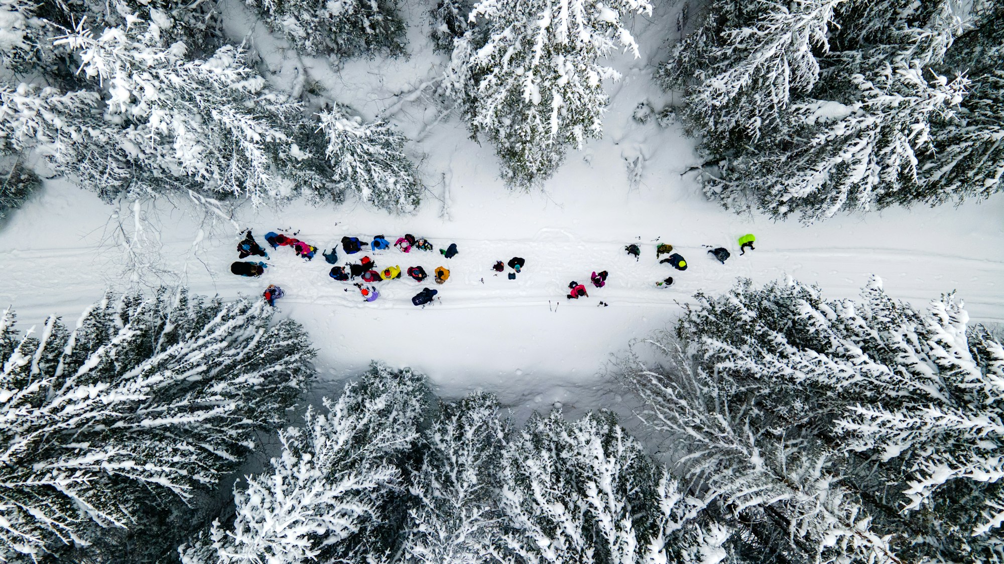 Aerial drone view of a hiking tour in the winter Carpathians, Romania