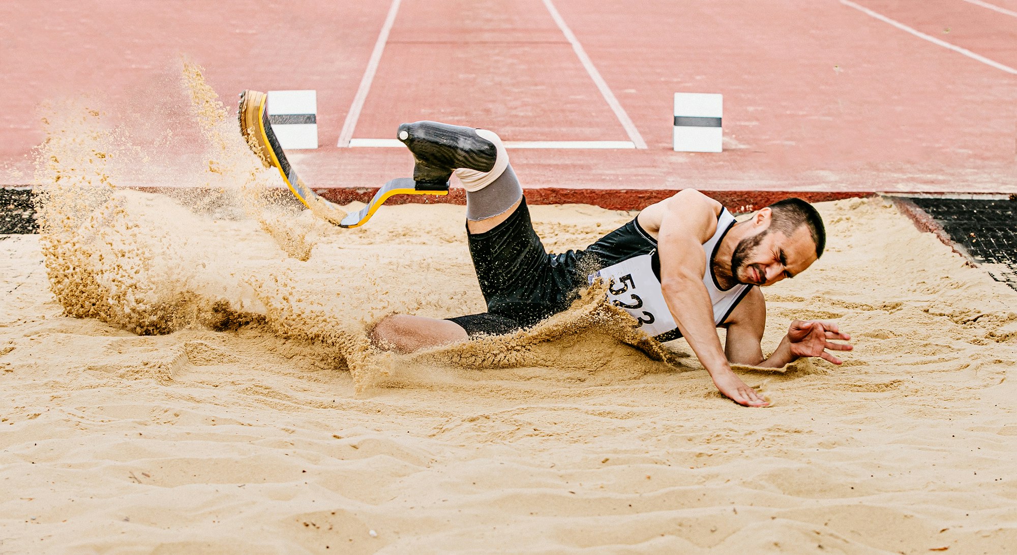 athlete disabled amputee long jump