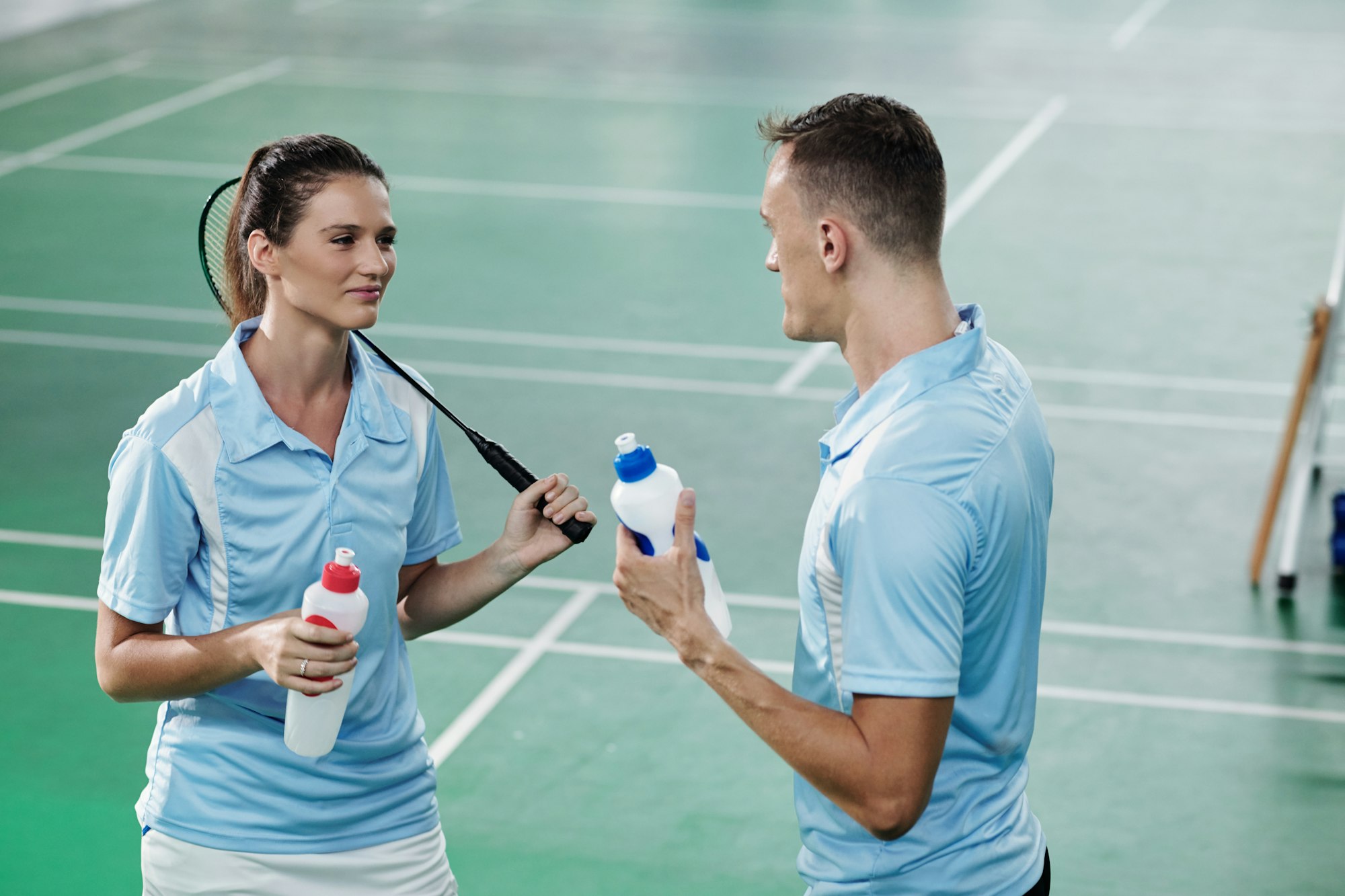 Couple Discussing Game of Badminton